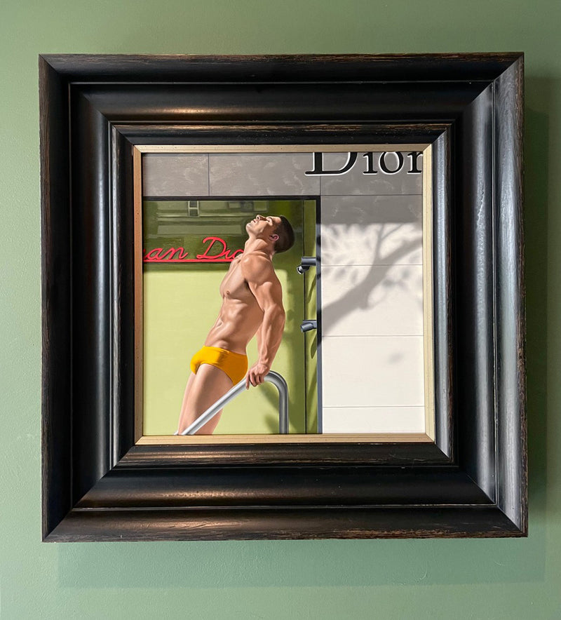 Original Ross Watson Painting of a man in yellow speedos with his head upturned to the sky painted within a Christian Dior window framed in an elaborate black frame
