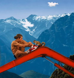 Fit shirtless man on red crane arm with squirril in front of Alpine mountains