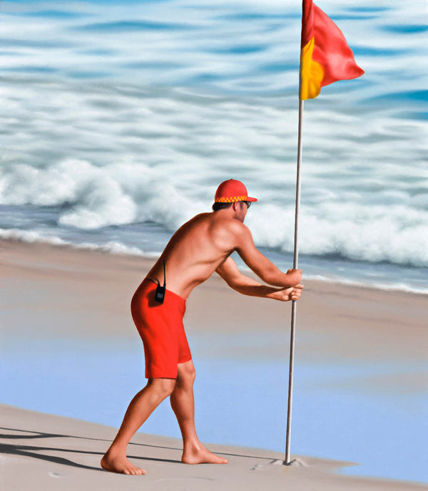 Ross Watson painting of lifesaver placing red and yellow flag into sand at the beach