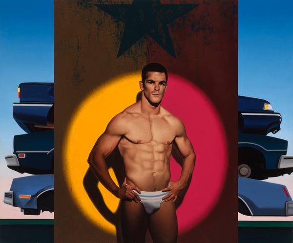 Portrait of Ian Roberts wearing a jock strap in spot light with orange and purple background and a stack of crushed cars behind