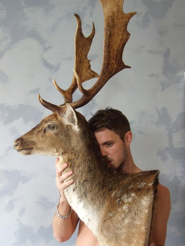 Ross Watson photography of Jake Shears holding a taxidermy deer head