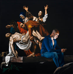 Man in foreground in blue hoody and jeans using phone sitting on stone slab with Caravaggio painting in background depicting the entombment of christ